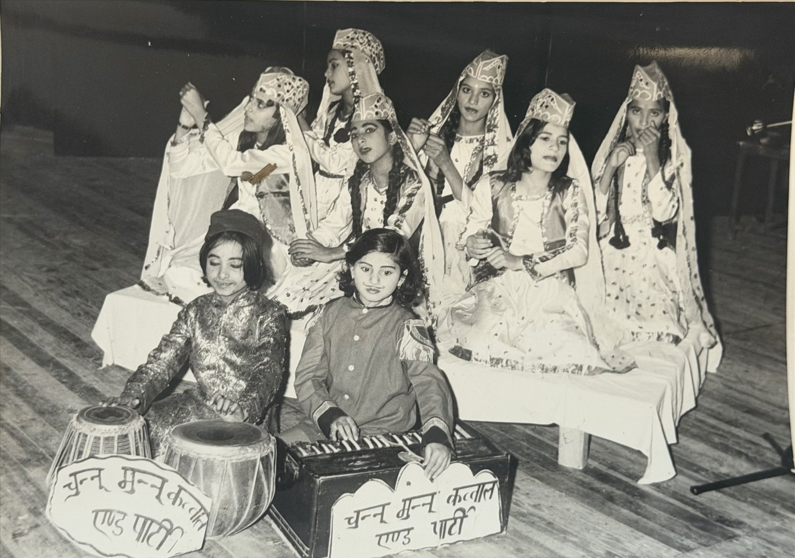 A folk-music act: girls in Kashmiri dress with tabla and harmonium, 1970s-80s