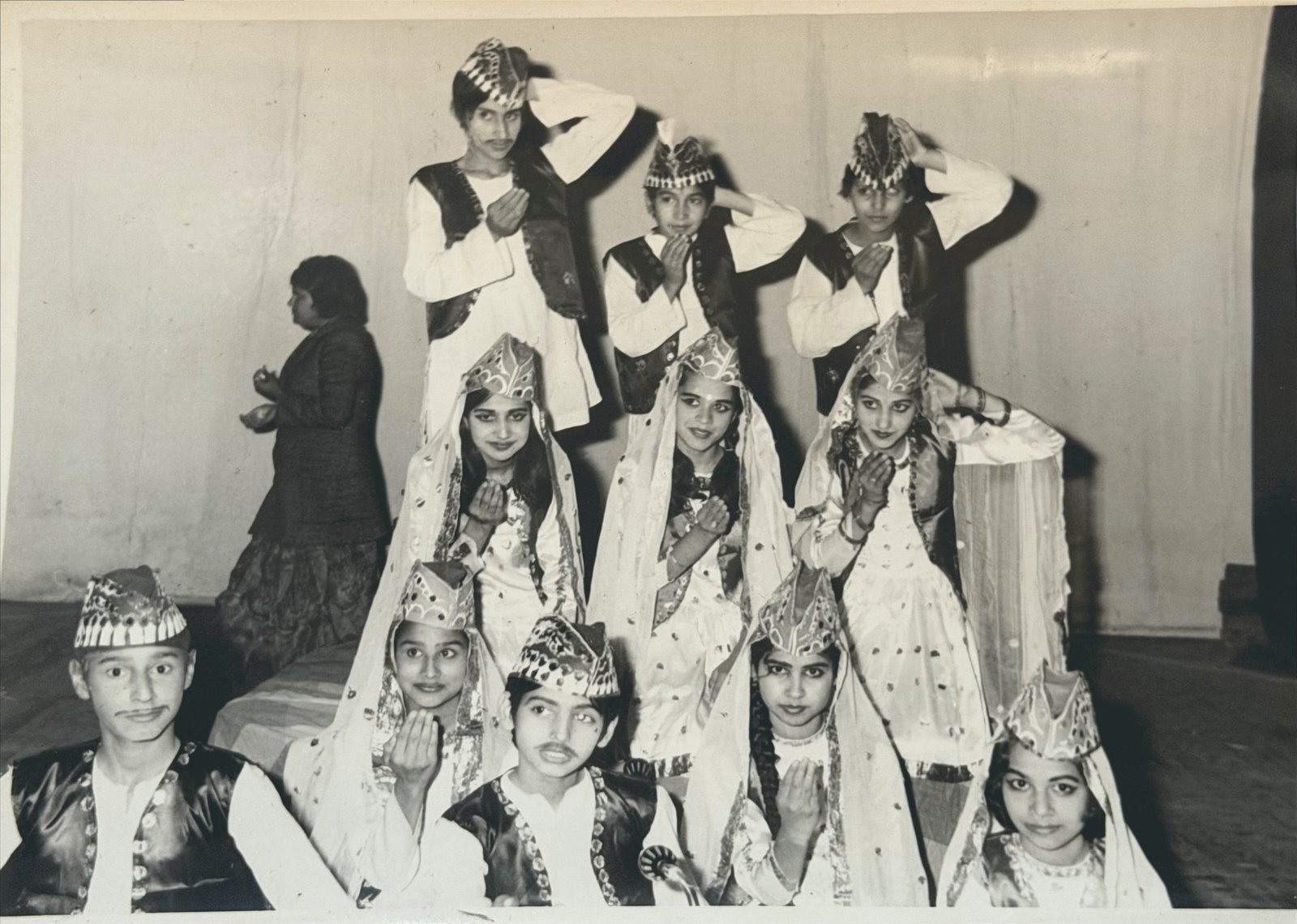 A costumed dance troupe in Kashmiri and Dogra dress at the annual function, 1970s-80s