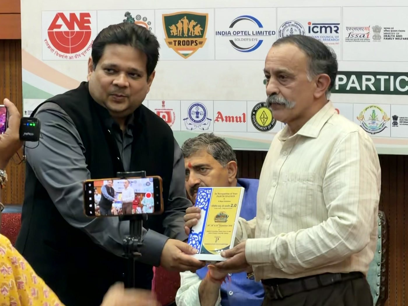A memento being presented on stage at Gatisheel Jammu and Kashmir 2.0