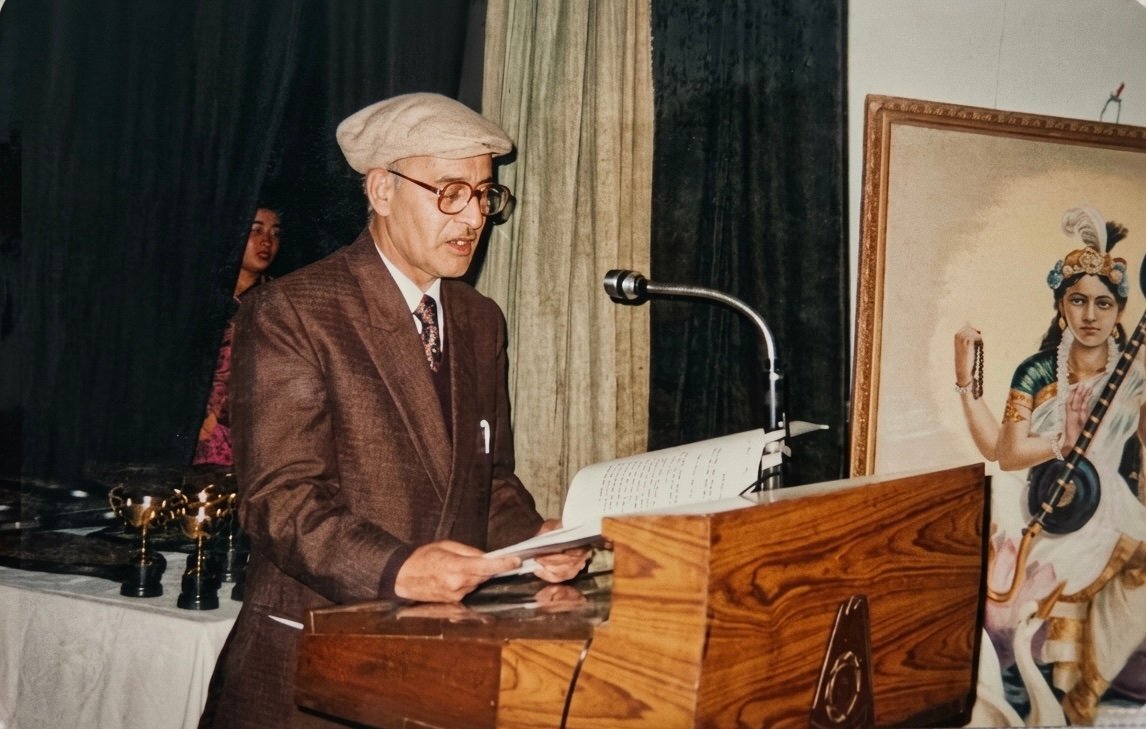 Late Sh. Ved Prakash Chauhan, Founder of Oriental Academy, speaking from the school podium