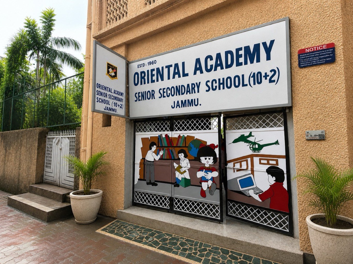 The main gate of Oriental Academy on Afghan Street, under the school signboard