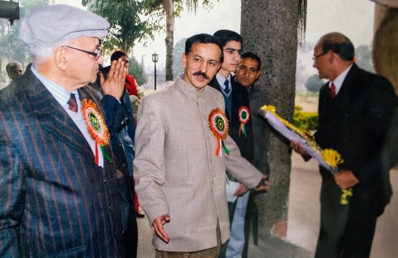 The founder and Principal Vivek Chauhan walking in together at a school event