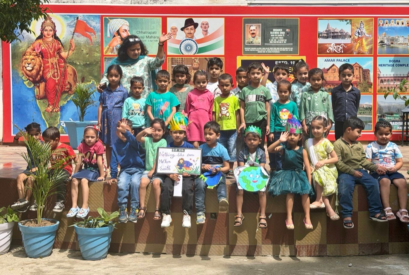 The youngest students with their Earth Day drawings: 'Nothing like our Mother Earth'